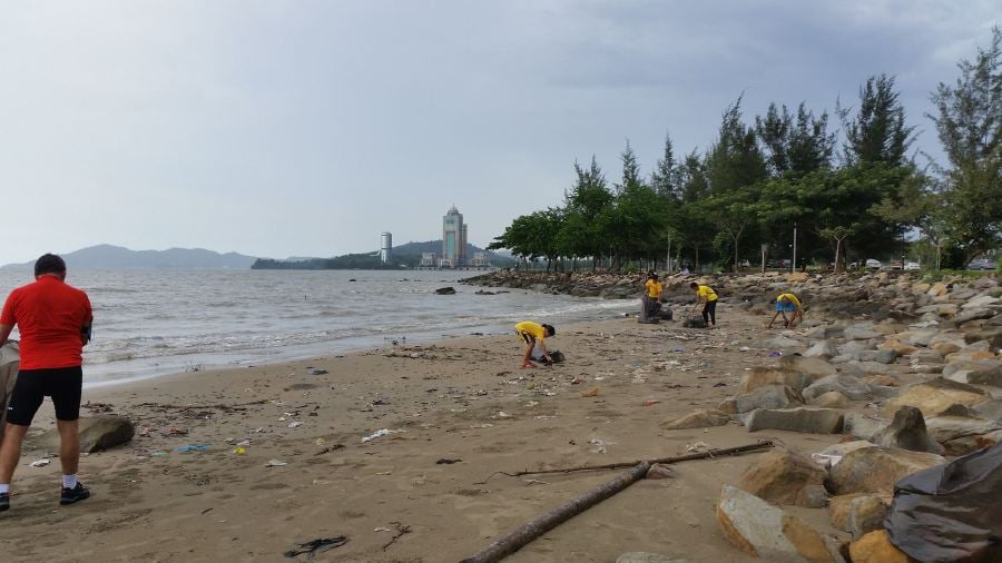 Malaysian beach full of litter