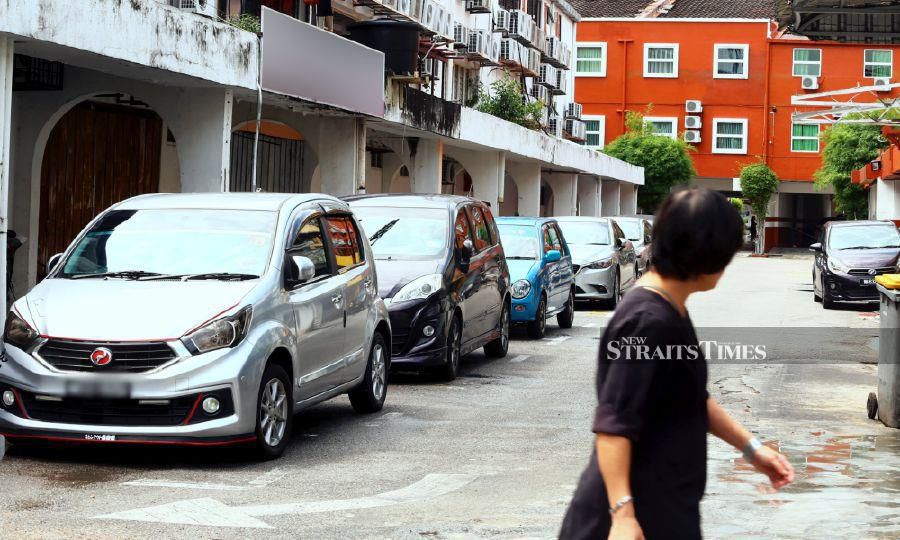 Several MBMB public parking areas around Kota Laksamana and Jonker Walk were also found to be the focus of touts to carry out illegal activities to make a profit. - NSTP file pic