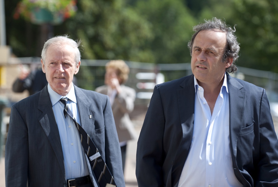 (FILES) In this file photo taken on June 11, 2011 UEFA president Michel Platini and his father Aldo (L) arrive to attend a general assembly of the Lorraine Football League in Joeuf, eastern France.A museum dedicated to former football player Michel Platini and his father Aldo Platini is expected to open by 2020 in Joeuf, northeastern France, where Michel Platini started playing football. AFP PHOTO