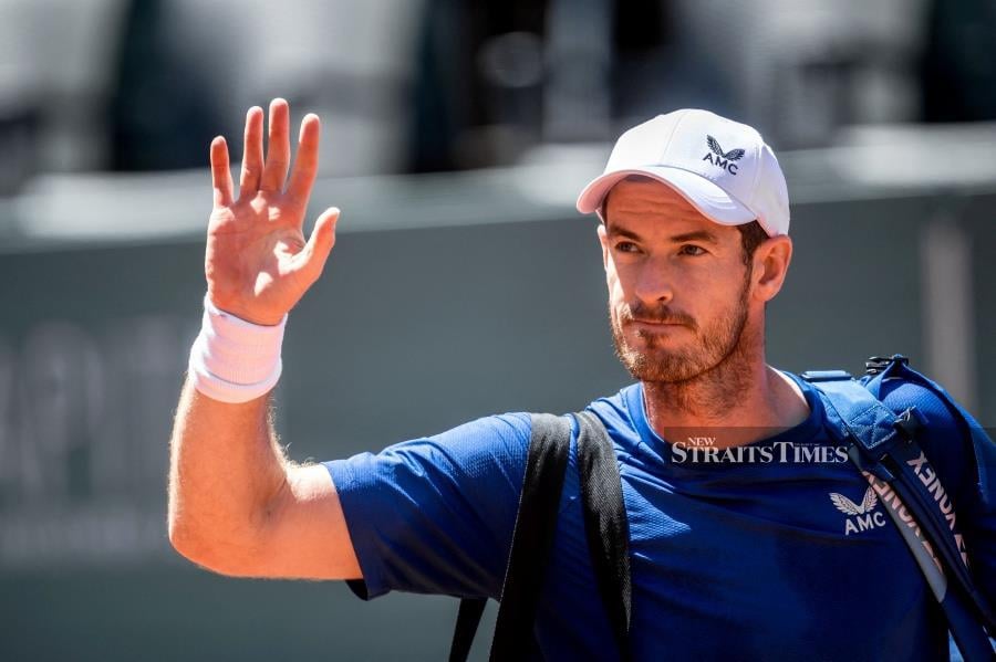 Britain's Andy Murray waves after losing against Germany's Yannick Hanfmann at the Geneva Open on May 21, 2024. AFP PIC