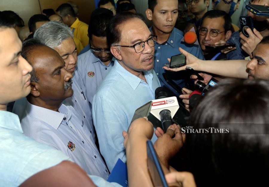 Anwar: Royal pardon for Najib to be reviewed in due time | New Straits