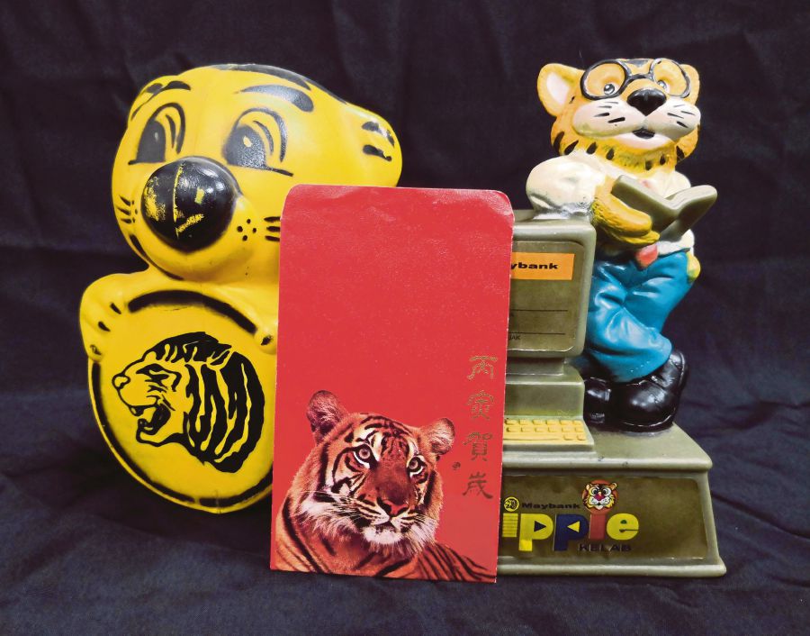 Maybank produced various memorabilia in the past, including coin boxes and red packets to create awareness of its mascot, the Malayan tiger. PIX BY ALAN TEH LEAM SENG