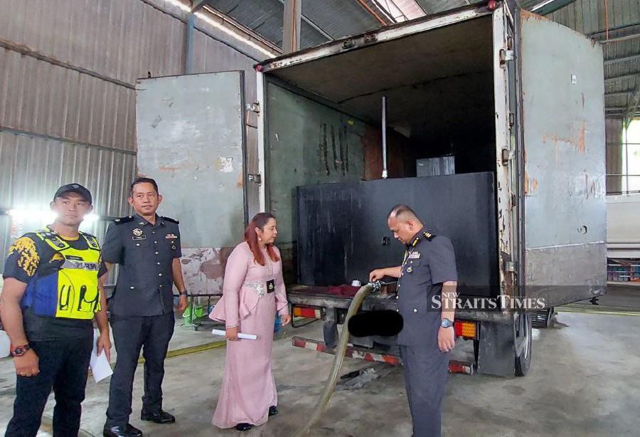 State Domestic Trade and Cost of Living Ministry director Norena Jaafar today said the seizure included several tanks of diesel, two lorry tankers and RM400,000 in cash. -NSTP/NURALIAWATI SABRI