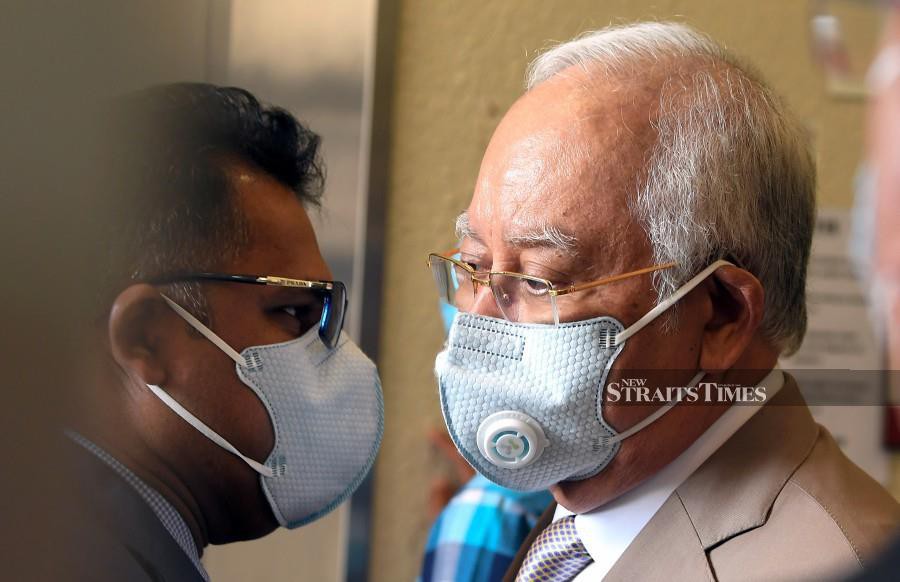Former prime minister Datuk Seri Najib Razak arrives at the Kuala Lumpur High court for his trial. Najib, 67, is facing 25 counts of abuse of power and money laundering involving RM2.28 billion of 1MDB funds. BERNAMA photo