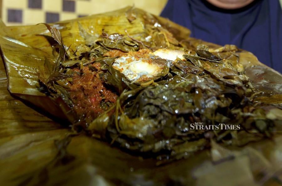 "Botok-botok," a traditional Javanese dish made from steamed fish and a blend of aromatic herbs, has gained popularity in Johor and is often offered to guests. -NSTP file pic