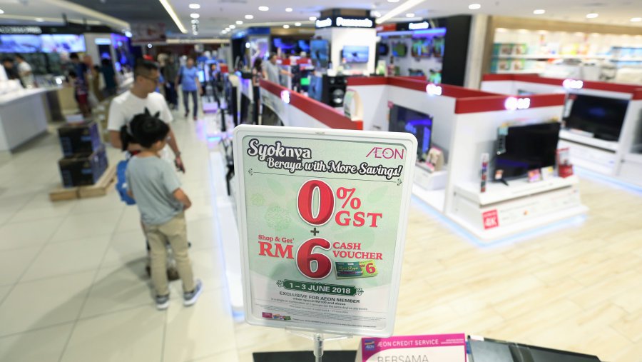 Checks by NSTP reporters at Mid Valley Megamall saw excited consumers browsing through new gadgets and electronic items after the zero rated GST came into effect. Pix by Rosela Ismail