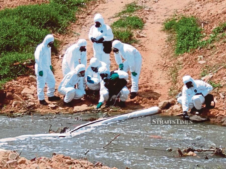 A file pic showing samples taken from Sungai Kim Kim, Pasir Gudang. - NSTP file pic