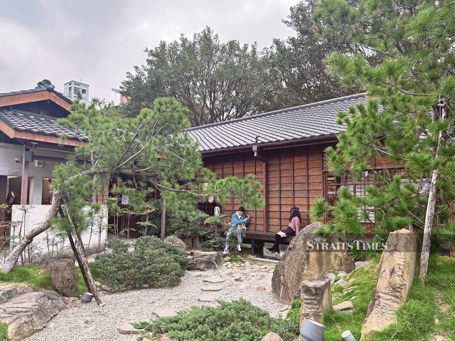  Tourists flock to the Rongjin Gorgeous Time in Taipei — which used to serve as accommodation for Taipei Prison personnel — to enjoy the tranquillity of the wooden Japanese-style houses amid Sakura trees. PIX BY ALIZA SHAH