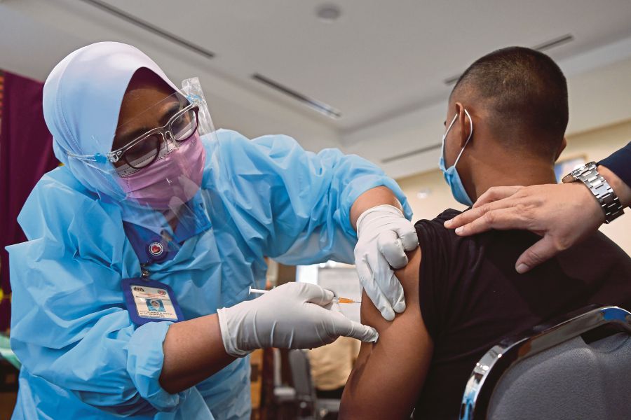 If all goes according to plan, the Covid-19 vaccination will be rolled out like clockwork over a one-year period. - BERNAMA pic