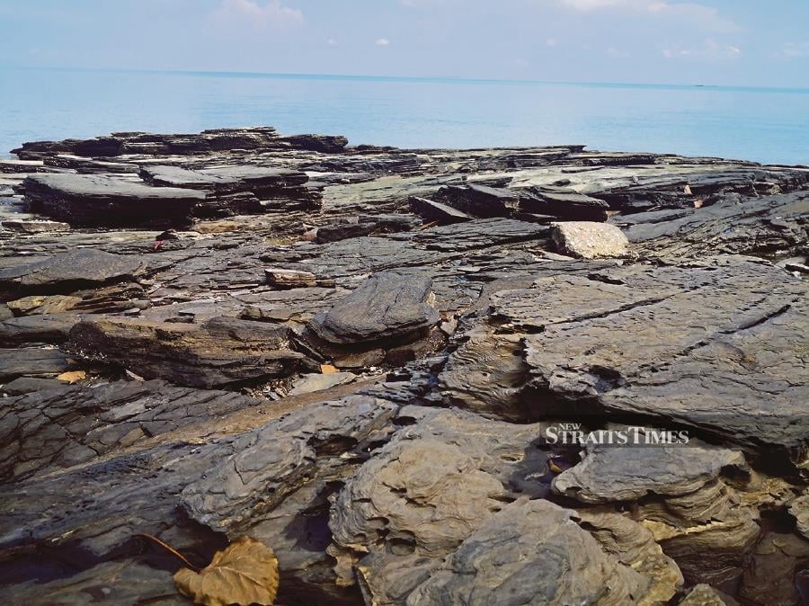 The rocky shoreline at Tanjung Peluru Geotrail. Pix by Alan Teh Leam Seng