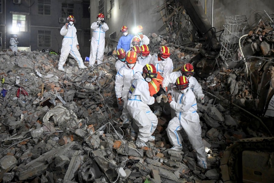 State media: Death toll rises to 26 in Chinese building collapse | New ...