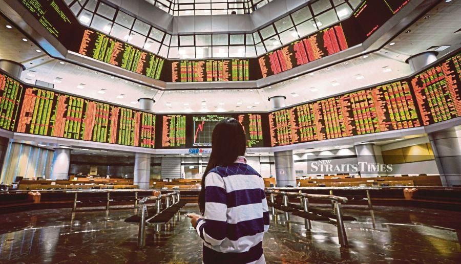 The benchmark index FTSE Bursa Malaysia KLCI barely managed to stay above the 1600 mark as profit-taking in heavyweights pushed it lower, while the broader market stayed positive at midday. NSTP/ASWADI ALIAS.