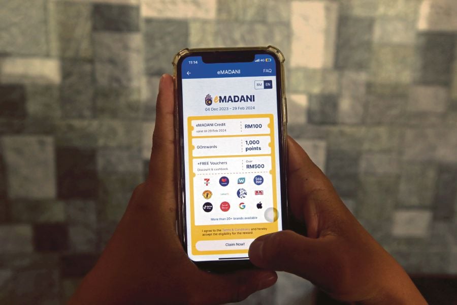 The e-Madani programme, a one-off RM100 e-wallet credit for some 10 million eligible Malaysians, has been caught in the centre of a social media storm as netizens expressed their outrage and disappointment over their failure to get their applications approved. - NSTP/HAIRUL ANUAR RAHIM