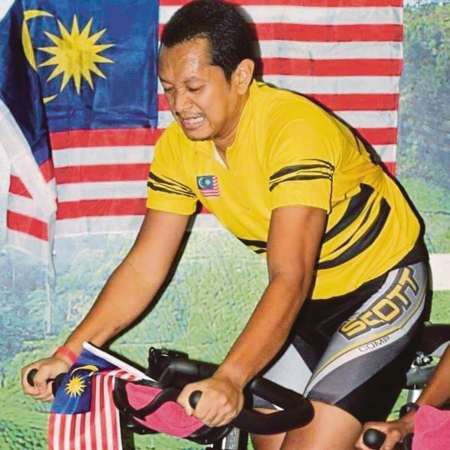 Former cycling coach Azmy Mohamad hopes the New Year will bring stability and for all to be able to get back to a life of normalcy. PIC COURTESY OF AZMY MOHAMAD 