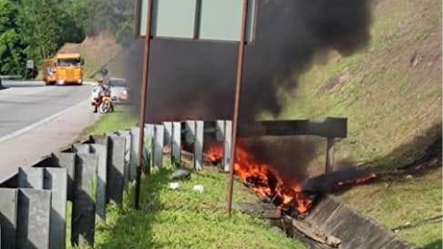 The Lamborghini Huracan burning at the side of the Kuala Lumpur-Karak Highway. Police say the driver, who was killed in the incident, had lost control of the vehicle before the crash. Pic courtesy of Fire and Rescue Department