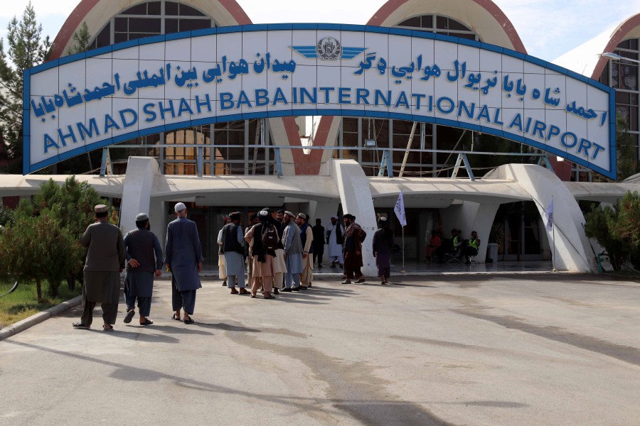 Passengers arrive to take a domestic flight after flight operations resumed across Afghanistan, at Ahmad Shah Baba International Airport in Kandahar, Afghanistan. - EPA pic