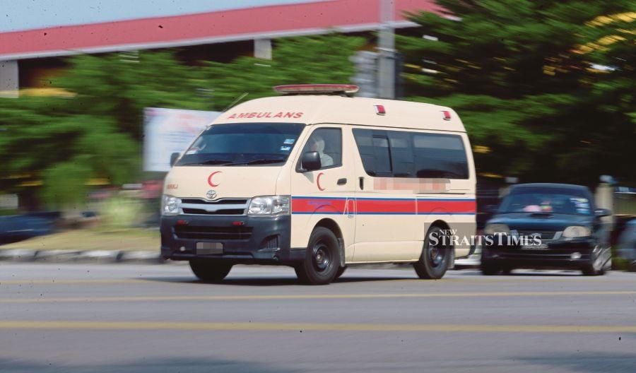 Ambulance drivers have to balance between rushing a patient to the emergency department in a life-or-death situation while ensuring the safety of passengers in the vehicle. PIC BY SYAMSI SUHAIMI