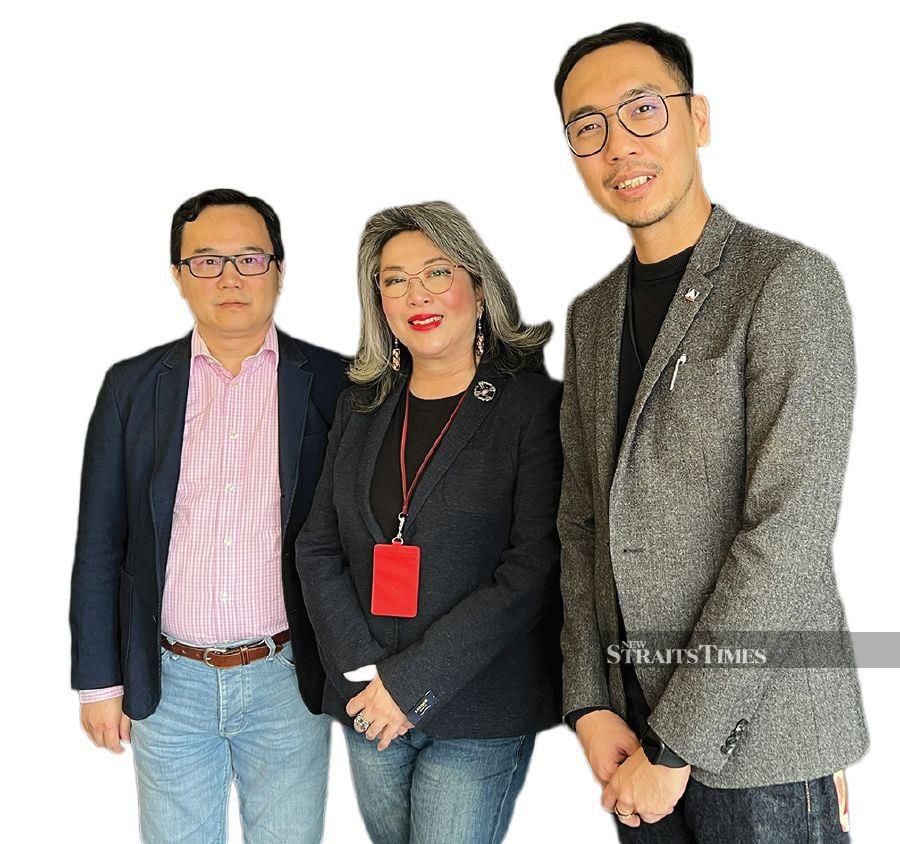 Alliance Bank Malaysia Berhad group chief consumer banking officer Gan Pai Li (centre) with Alliance Bank’s group digital transformation head Ken Yong (left) and credit card & personal loan products and acquisition vice-president David Lim. Pic by Izwan Ismail