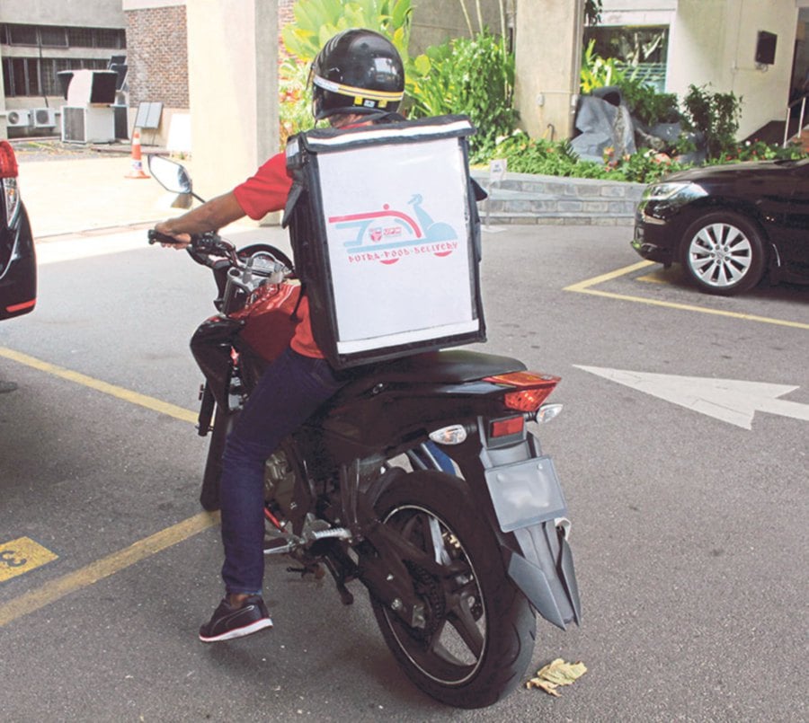 delivering food on a motorcycle