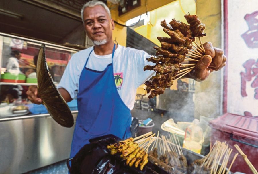 The satay in Muar is different from those served in the Klang Valley. Pix by Adi Safri