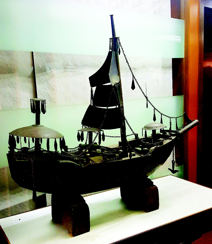  The eclectic collection includes this model of a Malay sailing ship. 