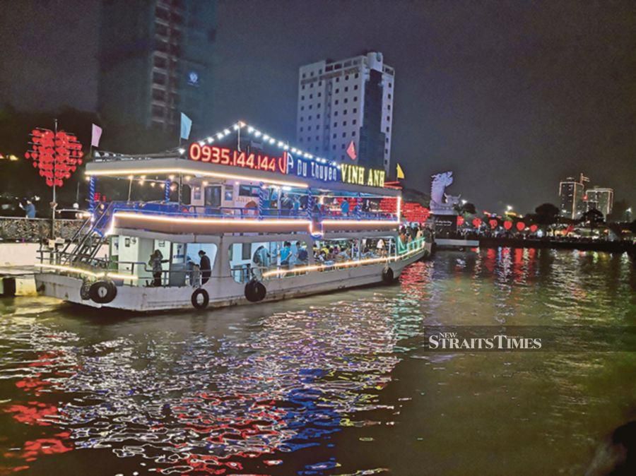 Take in the sights during the night river cruise.