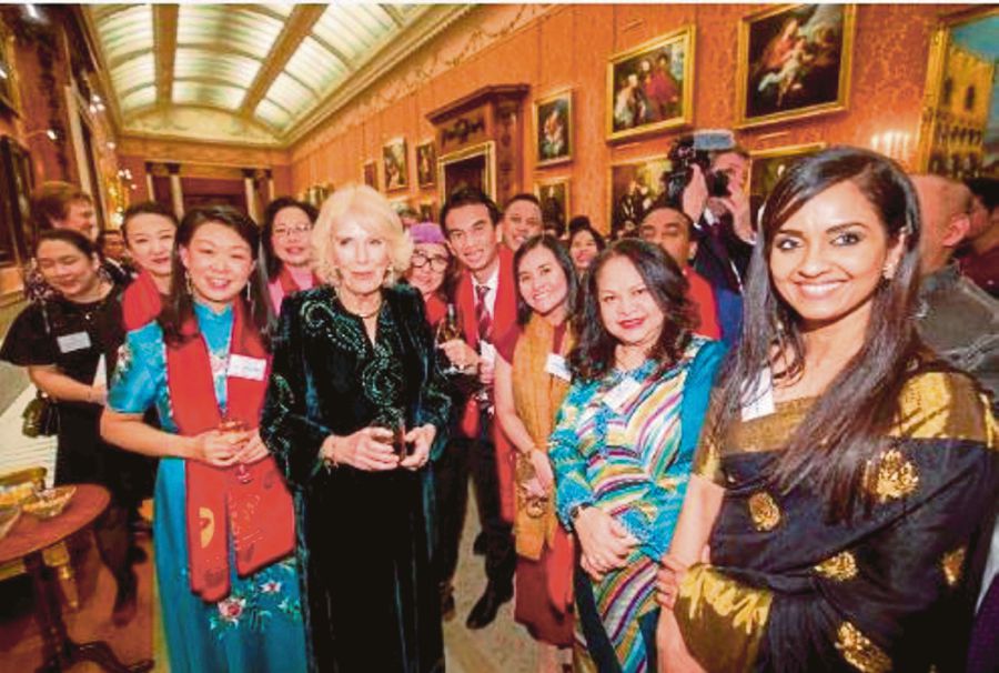 Queen Consort Camilla (centre) with guests who attended the reception at Buckingham Palace, including Matrade Trade Commissioner Nurdiana Abdullah (second from right) and Trade officer Sivagami Vinayagan (right). 