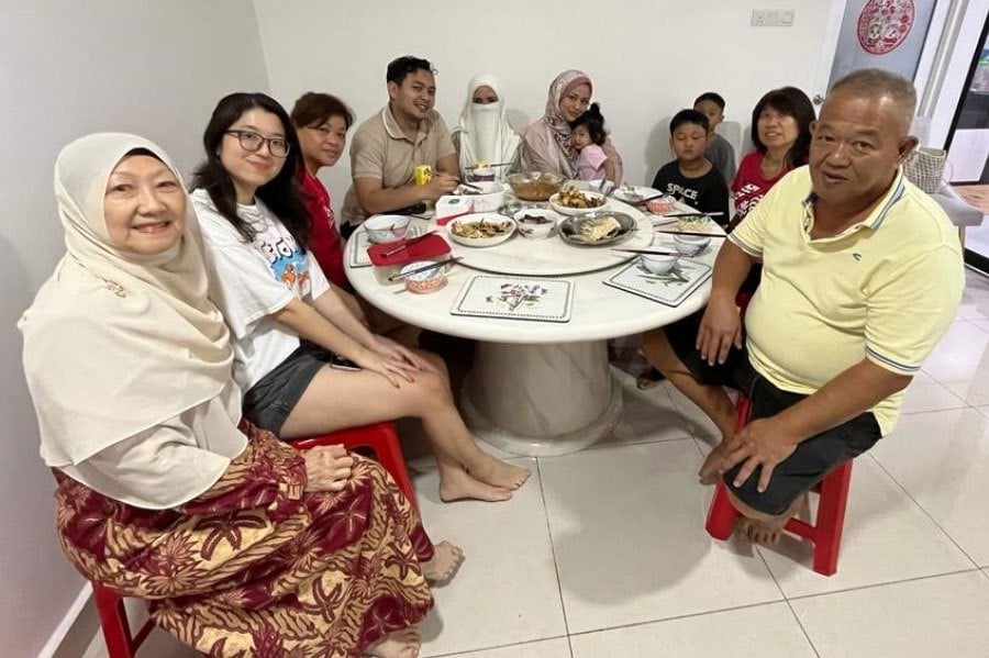The harmonious extended family of Datin Norhana Abdullah @ Ng Siew Boey (left), 65, which celebrates various festivals every year, is testimony that religious diversity in Malaysia is not a barrier to creating happiness together. COURTESY PIC