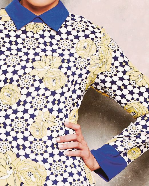 A print — softened by floral illustrations — inspired by tiles at the Alhambra.