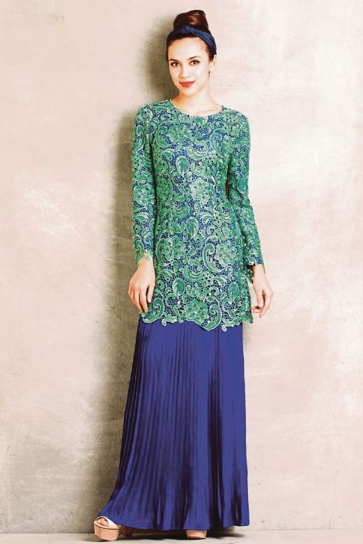  Look outstanding in rich embroidered lace overlaid over bright jewel tone fabric. 
