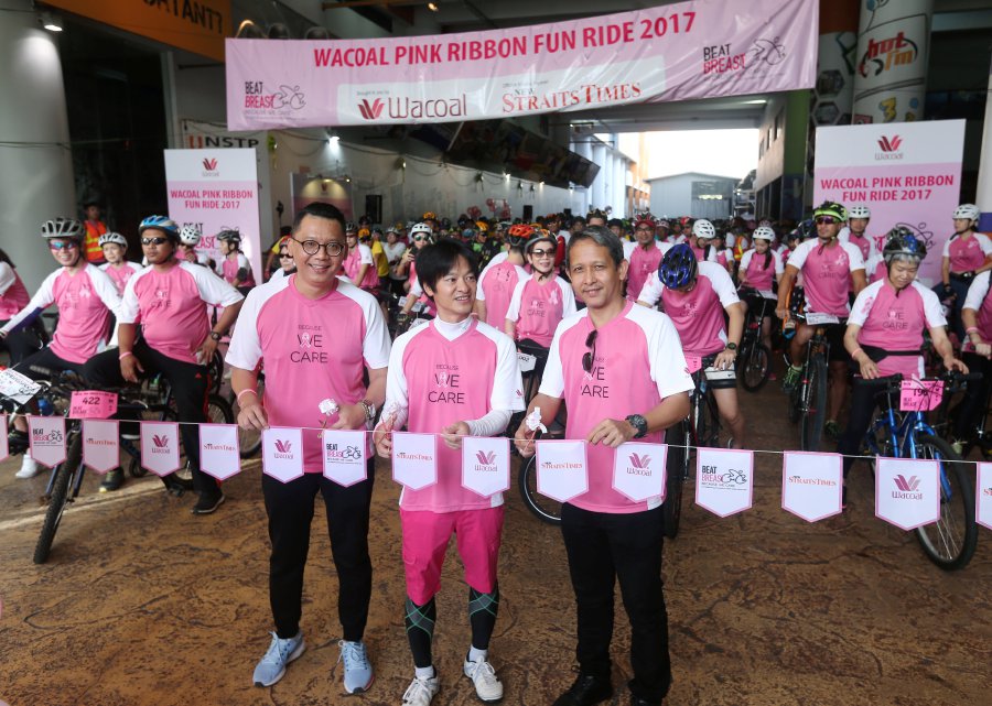 700 Cyclists Pedal Across City In Support Of Breast Cancer Awareness