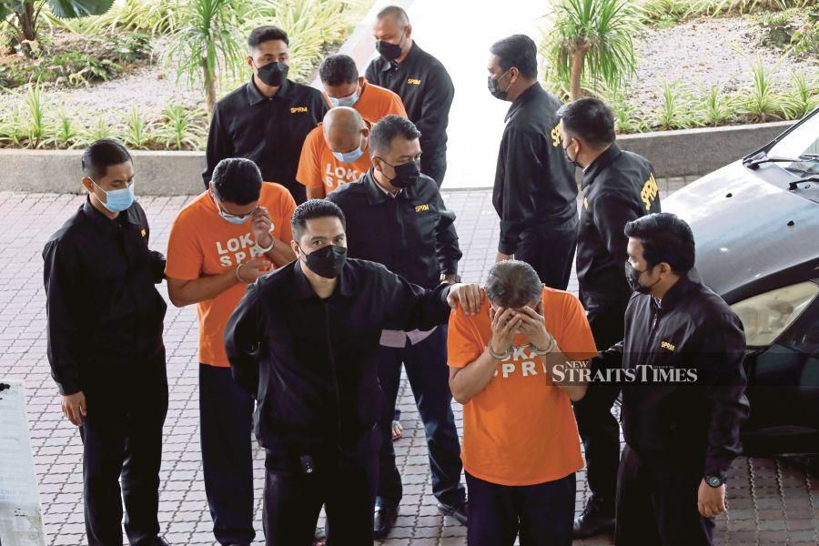 Four enforcement officers have been remanded for three days from today for allegedly soliciting and receiving RM14,000 in bribes from a company owner for five years. NSTP/FAIZ ANUAR 