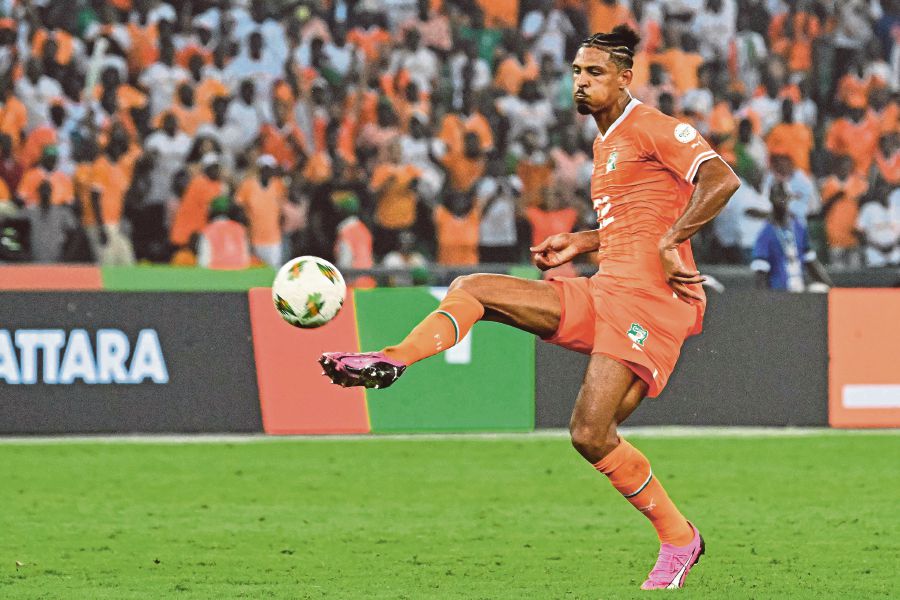 Ivory Coast's forward #22 Sebastien Haller controls the ball during the Africa Cup of Nations (CAN) 2024 semi-final football match between Ivory Coast and Democratic Repuplic of Congo on February 7, 2024. - AFP pic