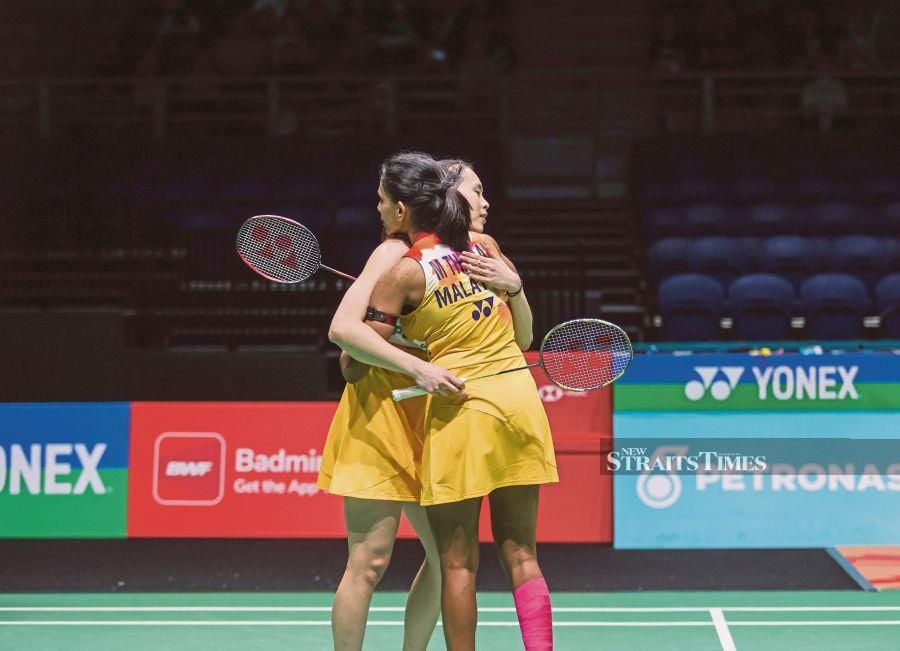 Pearly Tan and M. Thinaah after losing in the Malaysia Open first round at Axiata Arena. Pic by ASWADI ALIAS 