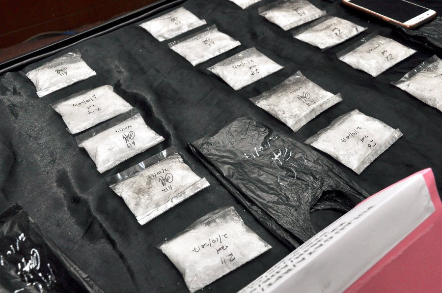 Sandakan police nabbed two people and seized drugs worth RM55,000 during two separate raids. File pic by MOHD ADAM ARININ.