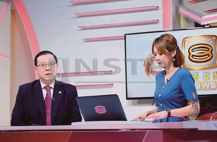 Finance Minister Lim Guan Eng on 8TV Mandarin news at Sri Pentas in Petaling Jaya on Thursday. - NSTP/EIZAIRI SHAMSUDIN