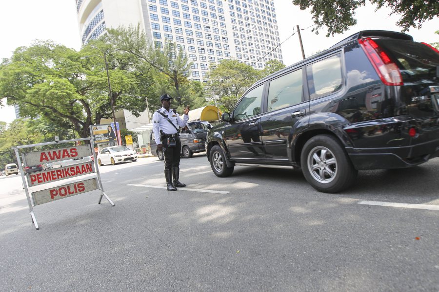 Man Shot After Evading Taman Tun Roadblock Leading Police