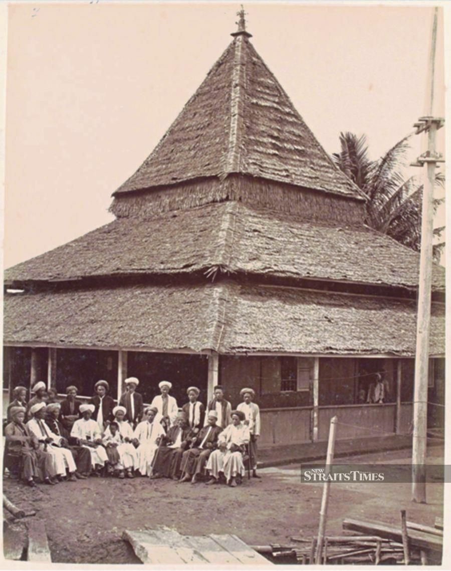 An old photo of Java Street Mosque shown by Jane.