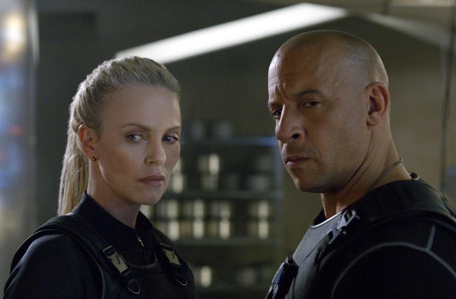 This image released by Universal Pictures shows Charlize Theron, left, and Vin Diesel in "The Fate of the Furious." Universal Pictures via AP 
