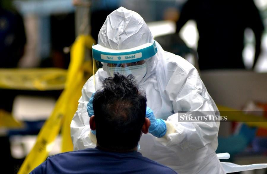 Countries thrashing out a historic agreement on tackling future pandemics have one month to bridge their differences because failure cannot be an option, the negotiations co-chair told AFP. STR/FAIZ ANUAR