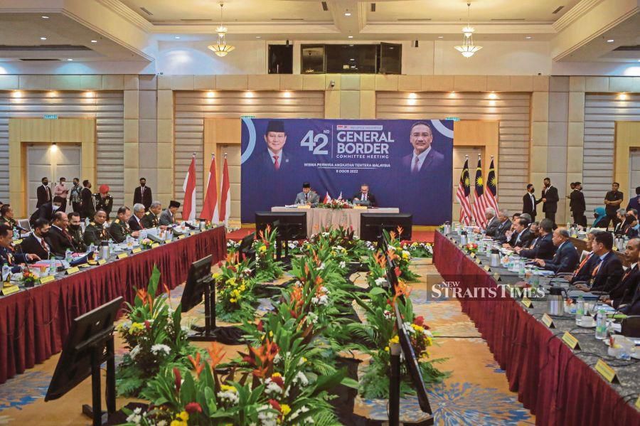 The 42nd General Border Committee Malaysia-Indonesia meeting in progress  on Tuesday.  PIC BY ASYRAF HAMZAH