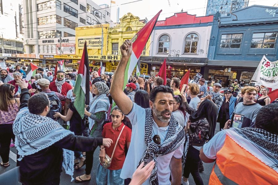 (File pix) Pro-Palestine demonstrators are seen in Melbourne, Victoria, Australia, 07 April 2018. Palestine supporters have rallied over the recent killing of Palestinian protesters in Gaza. EPA-EFE Photo
