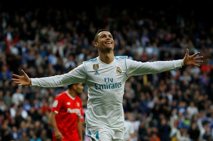 Ronaldo fires Real top, Barca held by Sevilla, Football