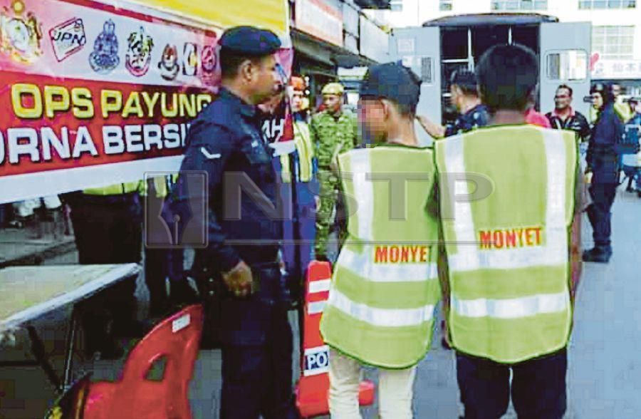 Jaujan, who is also Minister of state Housing and Local Government, also questioned the regulations used to allow the word MONYET to be used on the vest, which would be worn as a punishment for litterbugs. Pic by NSTP/Courtesy of NSTP readers