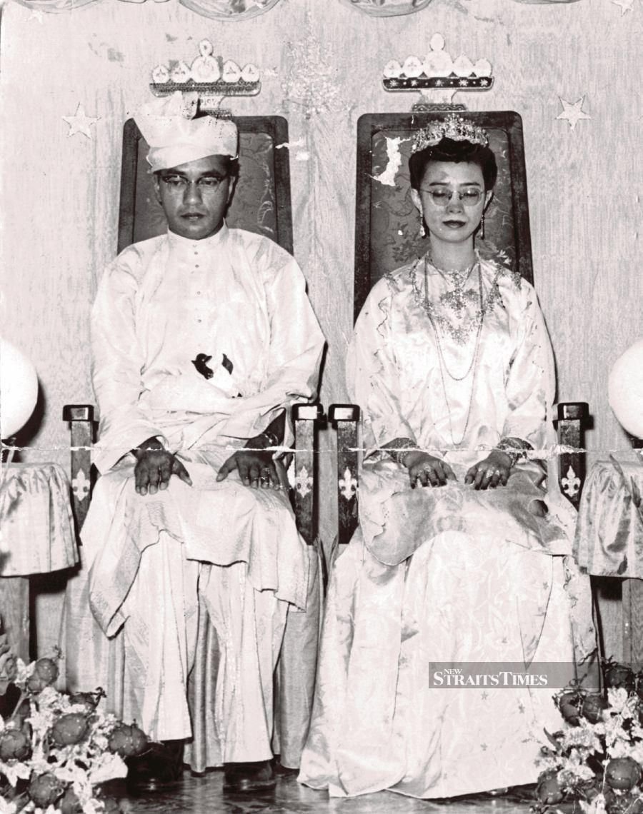 Tun Dr Mahathir Mohamad and Tun Dr Siti Hasmah Mohd Ali at their wedding ceremony in 1956.