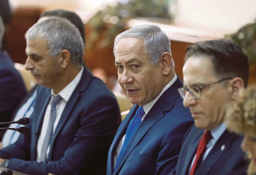 Israeli Prime Minister Benjamin Netanyahu during a cabinet meeting at his office in Jerusalem. He had called for a UN agency to be scrapped because it was aiding ‘fictitious refugees’. REUTERS PIC 