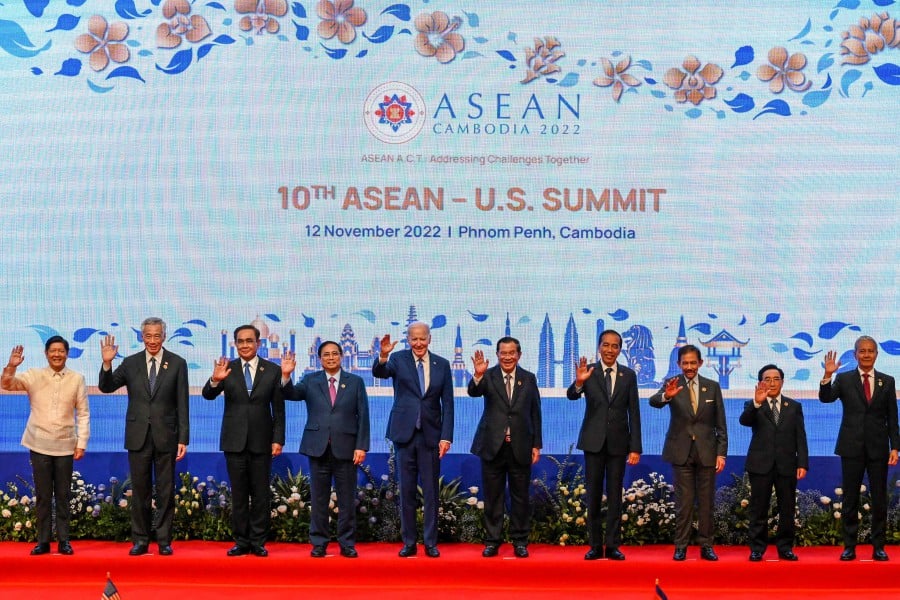 (L-R) Philippines' President Ferdinand Marcos Jr, Singapore’s Prime Minister Lee Hsien Loong, Thailand’s Prayut Chan-O-Cha, Vietnam’s Prime Minister Pham Minh Chinh, US President Joe Biden, Cambodia’s Prime Minister Hun Sen, Indonesia’s President Joko Widodo, Sultan of Brunei Hassanal Bolkiah, Laos' Prime Minister Phankham Viphavanh and Malaysia's lower house speaker Azhar Azizan Harun pose for pictures during the ASEAN-US summit as part of the 40th and 41st Association of Southeast Asian Nations (ASEAN) Summits in Phnom Penh. -AFP PIC