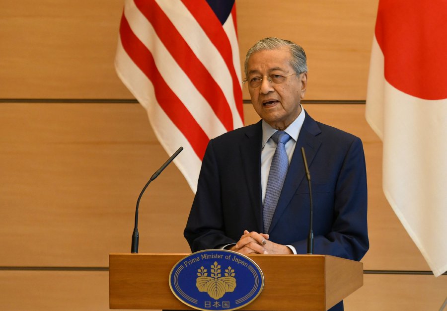 Prime Minister Tun Dr Mahathir Mohamad speaking in Tokyo, Japan, June 12, 2018. EPA-EFE Photo