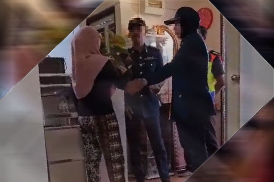 A woman believed to be a resident of a People’s Housing Project (PPR) was criticised by netizens after a video of her shouting at officers who came to resolve the issue of her overdue rent went viral. PIC SCREEN CAPTURED FROM SOCMED