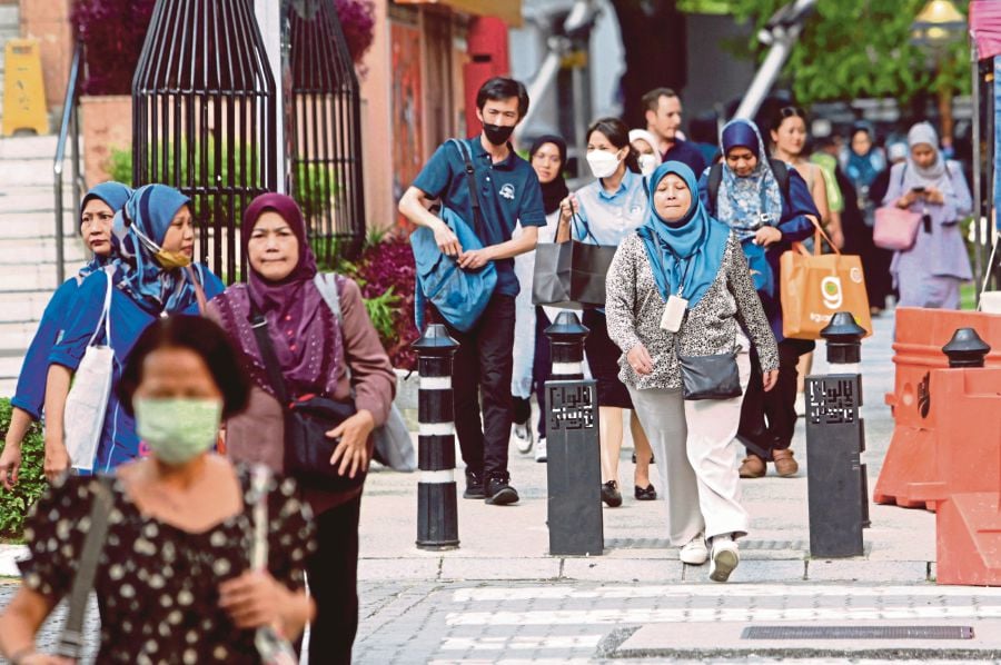  People heading to work in Kuala Lumpur. Jobstreet by Seek Malaysia’s Hiring Compensation and Benefits Report 2024 says this year will see an increase in tech and digital-related jobs. FILE PIC 